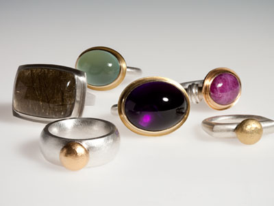 Assorted rings: silver, gold, rutile quartz, amethyst, ruby, aquamarine 